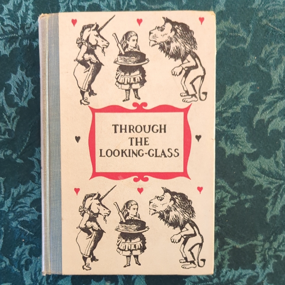 Junior Deluxe Editions Through The Looking Glass By Lewis Carroll.